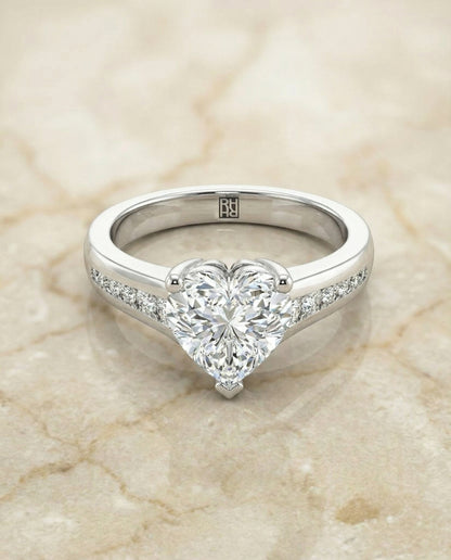 Contemporary Tapered Channel Heart Shape, in Platinum – angled view | RockHer