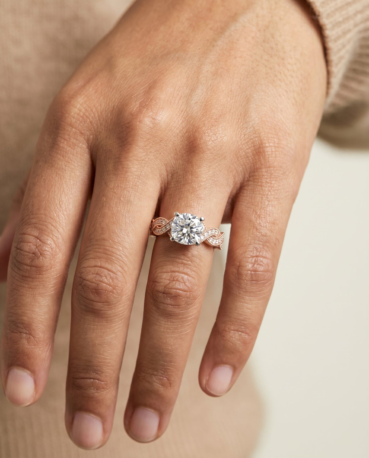 Marie Select Beaded Crossover Pavé Cushion Cut Lab Diamond Engagement Ring in 14K Rose Gold, shown on hand | RockHer
