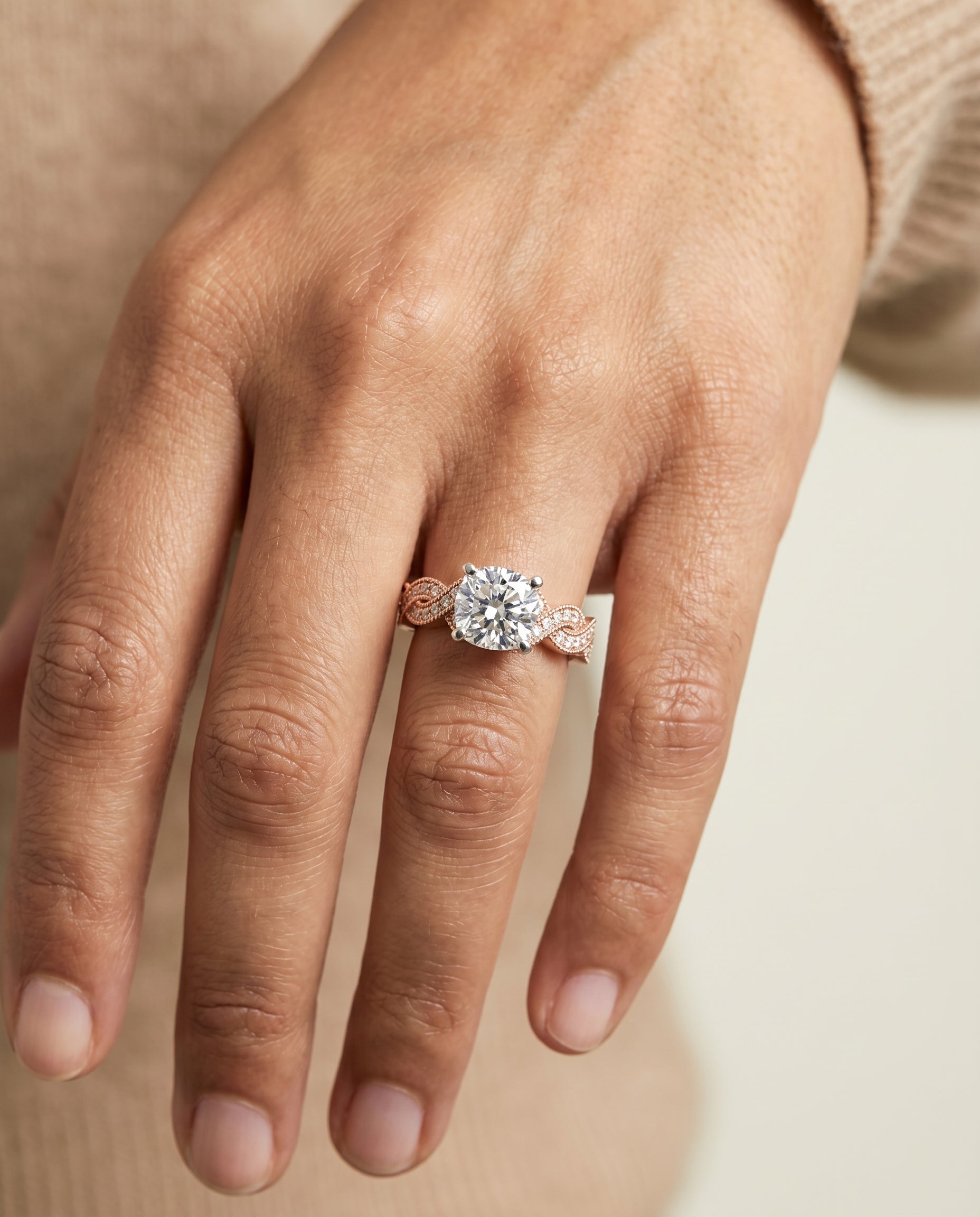 Marie Select Beaded Crossover Pavé Cushion Cut Lab Diamond Engagement Ring in 14K Rose Gold, shown on hand | RockHer