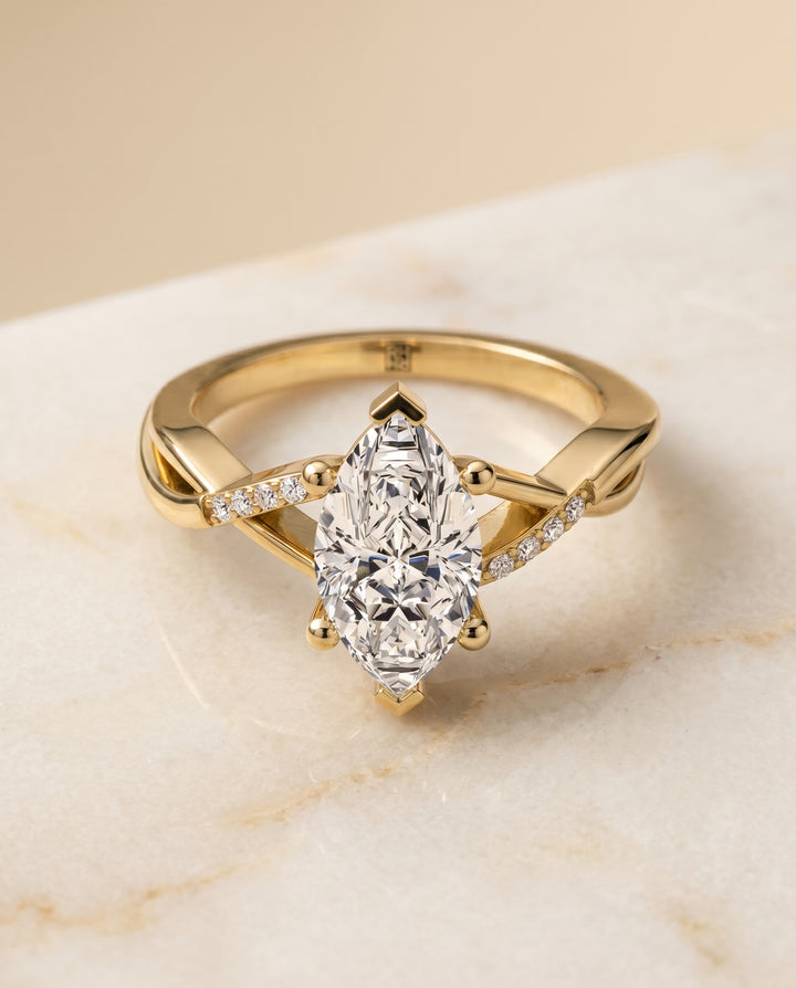 Criss Cross Bypass Twist Marquise, in 18K Yellow Gold – angled view | RockHer