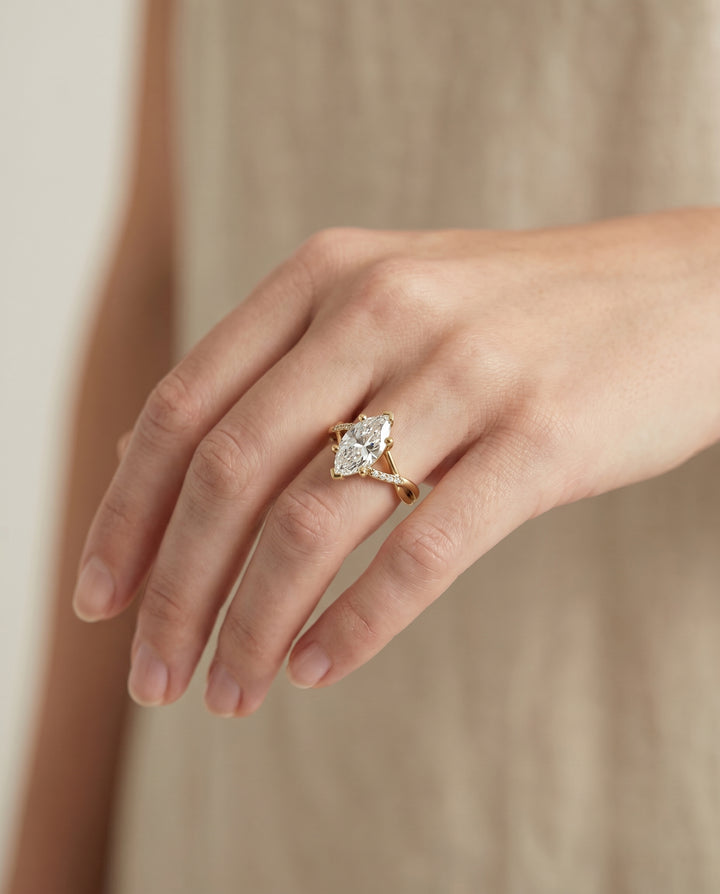 Criss Cross Bypass Twist Marquise, in 18K Yellow Gold – lifestyle shot | RockHer