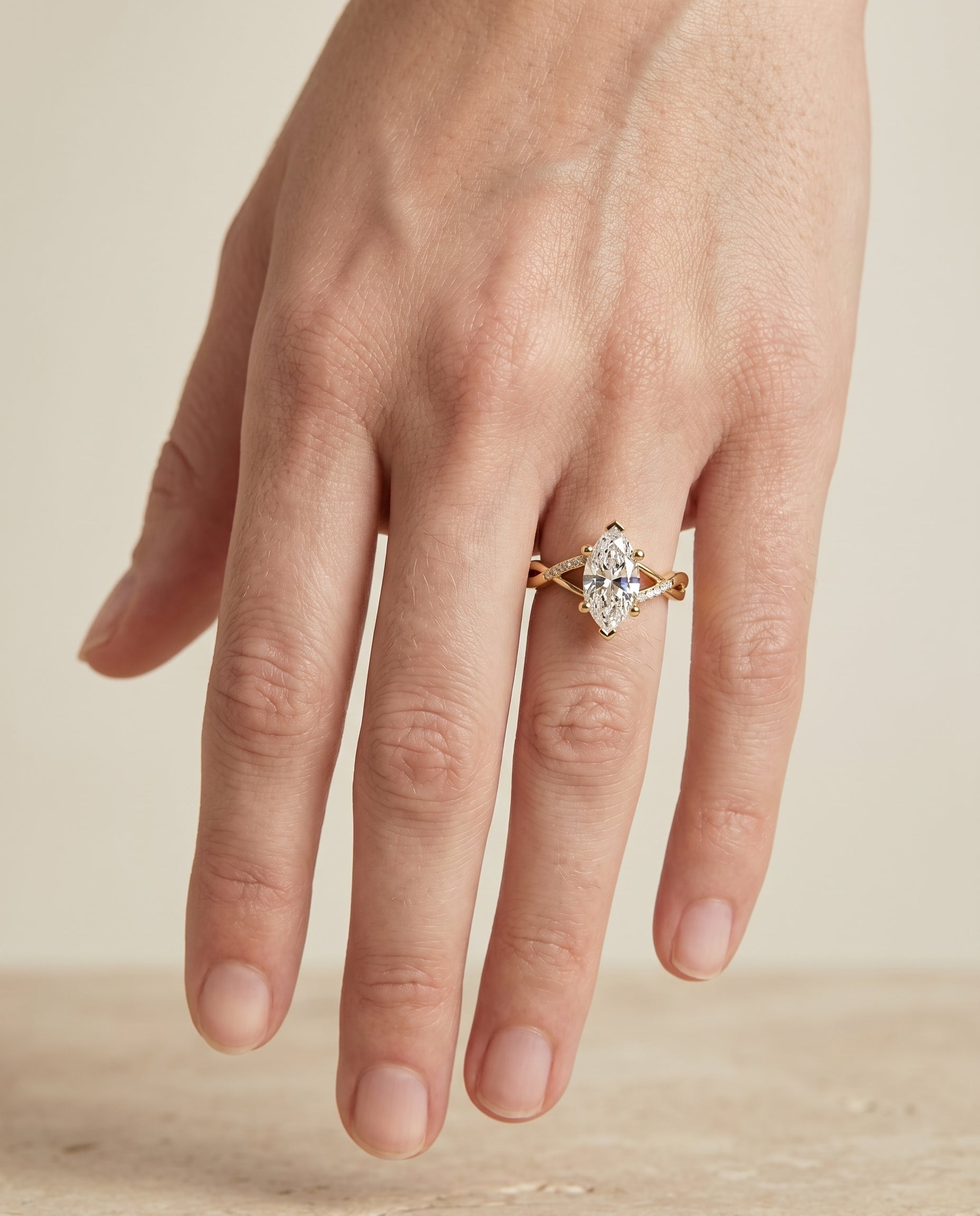 Athena Select Criss Cross Bypass Twist Marquise Lab Diamond Engagement Ring in 18K Yellow Gold, shown on hand | RockHer