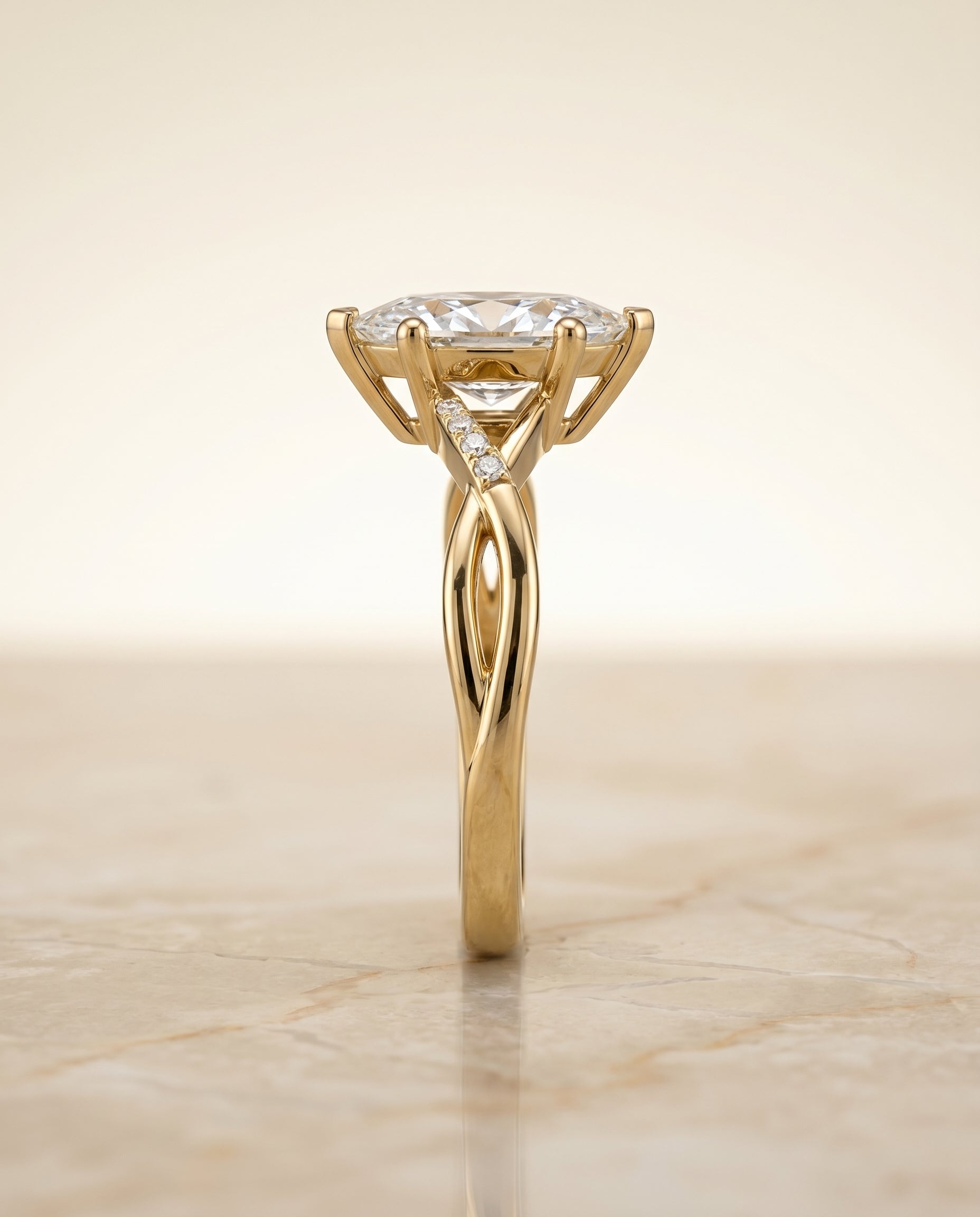 The Athena criss cross bypass twist engagement ring setting, shown in 18K Yellow Gold | RockHer