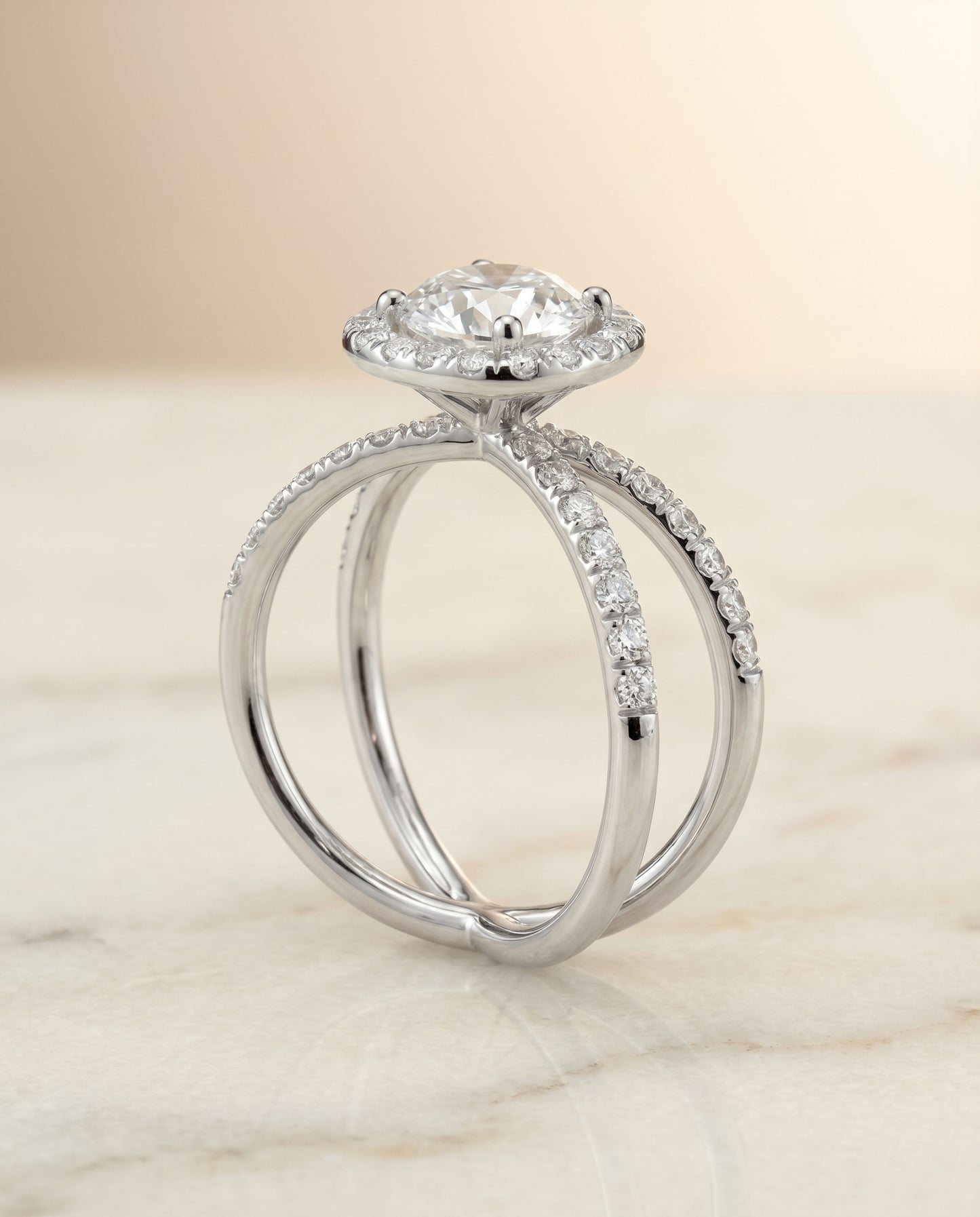 Round Brilliant, Criss Cross Pavé Halo, in Platinum, pave setting – angled view | RockHer