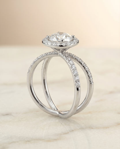 Round Brilliant, Criss Cross Pavé Halo, in Platinum, pave setting – angled view | RockHer