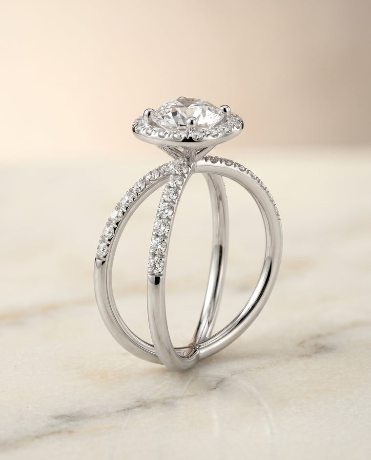 The Joan Crossover Pavé Halo Round Engagement Ring Setting in Platinum