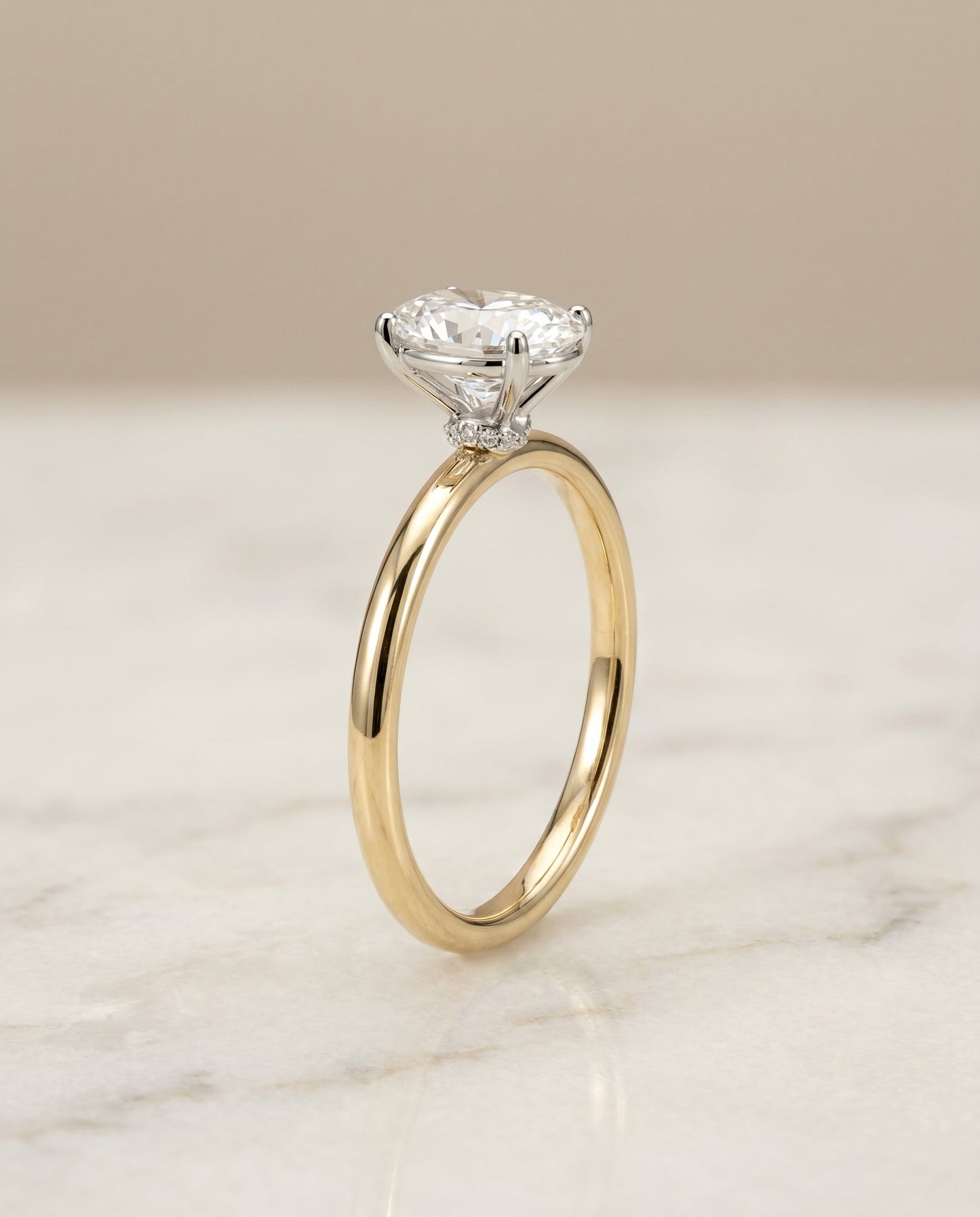 Cyndi Select Curved Hidden Halo Solitaire Oval in 14K Yellow Gold – view 1