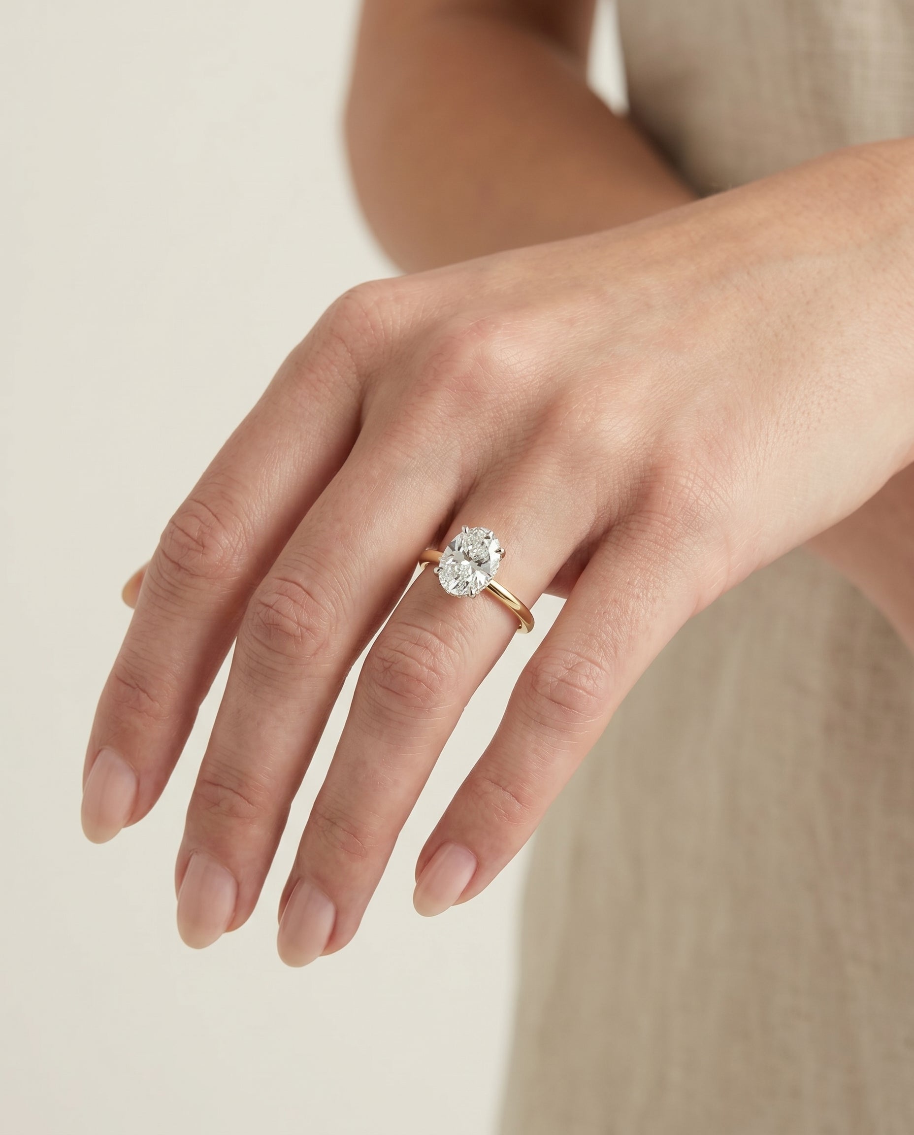 The Cyndi engagement ring setting in 18K Yellow Gold, curved hidden halo solitaire design | RockHer