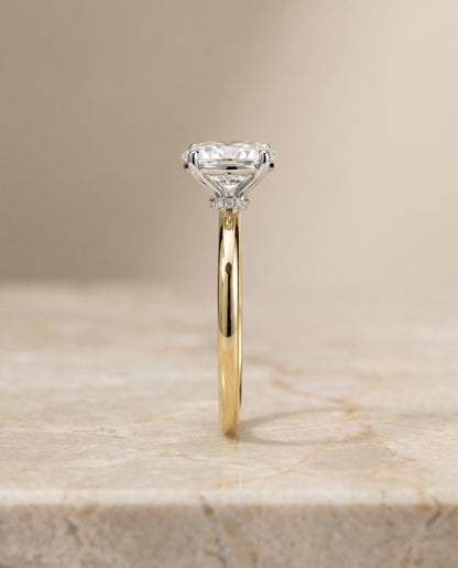 The Cyndi Curved Hidden Halo Solitaire Oval Engagement Ring Setting in 18K Yellow Gold