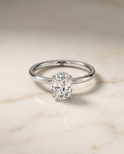 Cyndi Select Curved Hidden Halo Solitaire Oval Lab Diamond Engagement Ring in 18K White Gold, alternate angle | RockHer