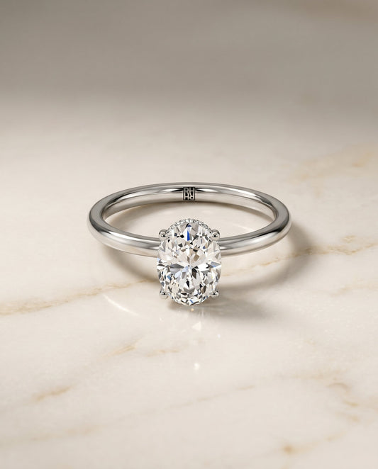 Cyndi Select Curved Hidden Halo Solitaire Oval in 14K White Gold – view 1