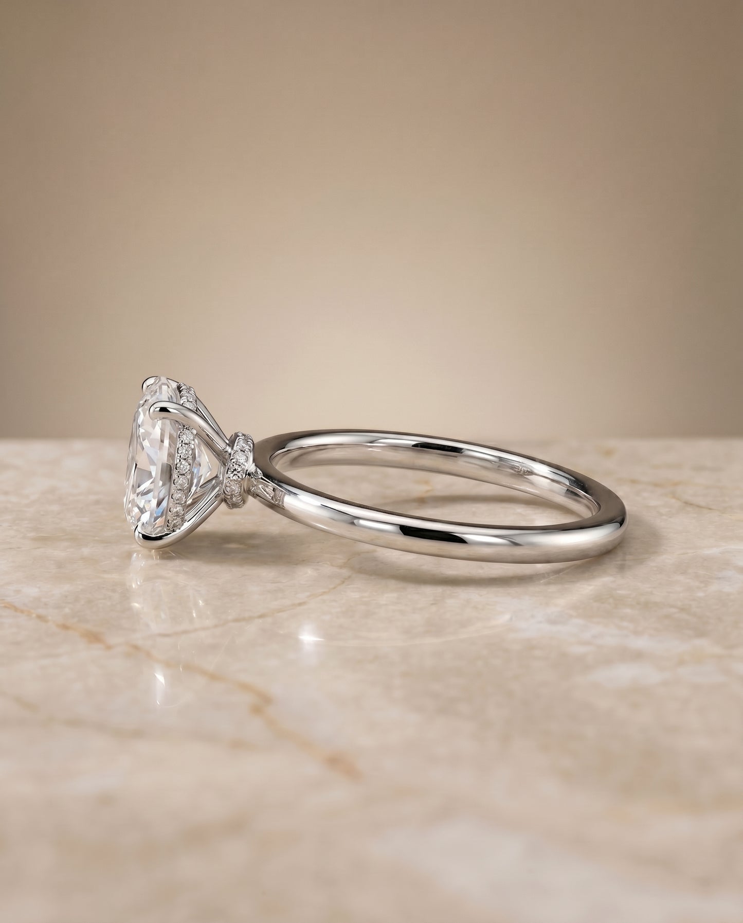 The Cyndi Solitaire Engagement Ring Setting for Oval Diamonds in 18K White Gold