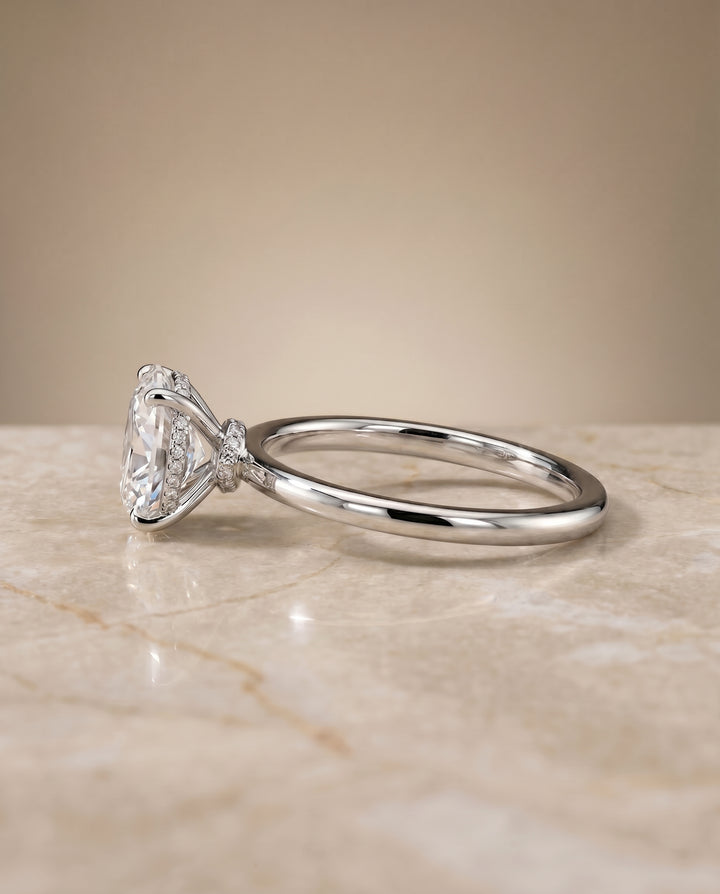 The Cyndi Solitaire Engagement Ring Setting for Oval Diamonds in 18K White Gold