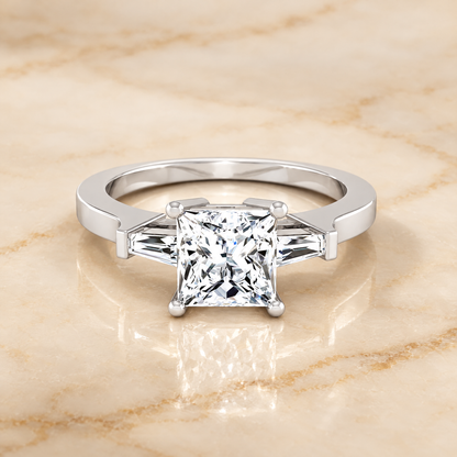 The June Three Stone Princess Cut Engagement Ring Setting in Platinum