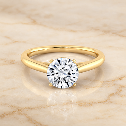 The Valerie Comfort Fit Secret Stone Solitaire Round Engagement Ring Setting in 18K Yellow Gold
