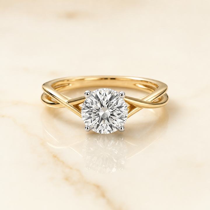 The Grace Solitaire Engagement Ring Setting for Round Diamonds in 18K Yellow Gold