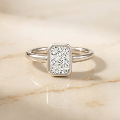 The Agnes Bezel Solitaire In Radiant Cut Engagement Ring Setting in 18K White Gold