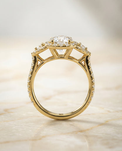 Round Brilliant, Delicate Three Stone Halo, in 18K Yellow Gold, pave setting – side profile | RockHer