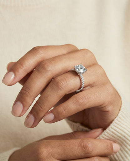 Tina Select diamond encrusted claw triple pavé cushion cushion ring in 14K White Gold — on hand angled — RockHer