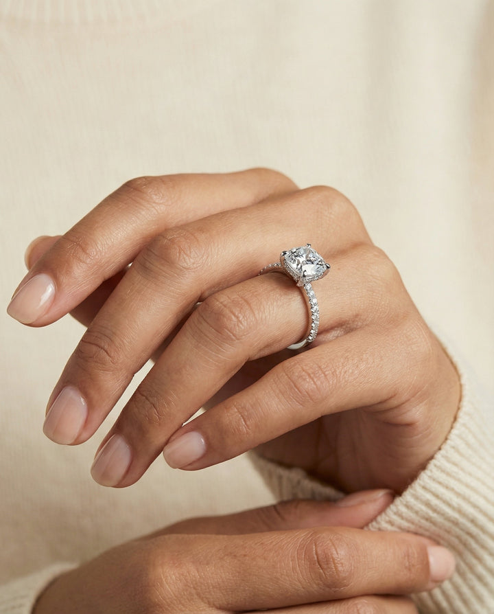 Tina Select diamond encrusted claw triple pavé cushion cushion ring in 14K White Gold — on hand angled — RockHer