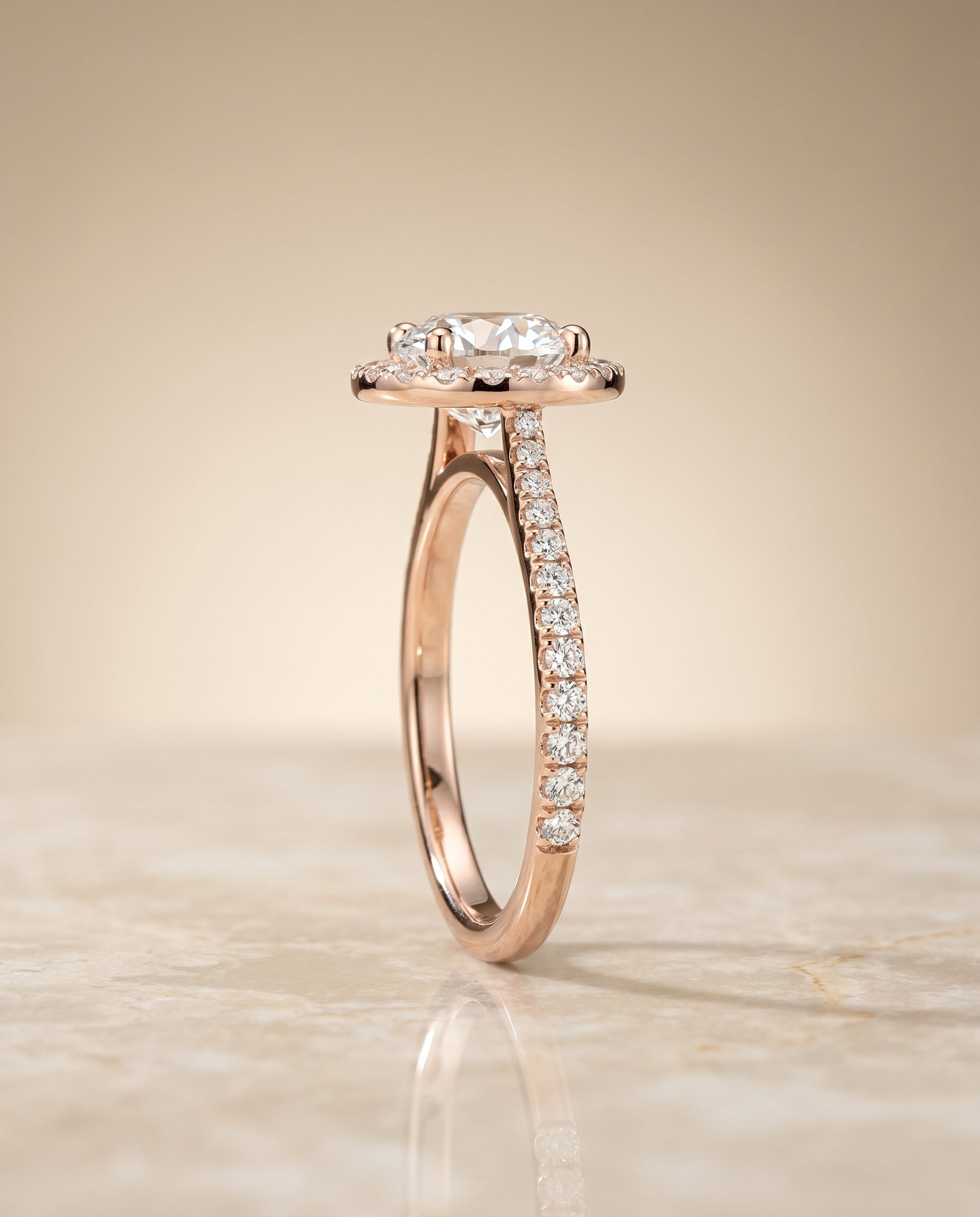 The Dionne diamond pavé halo engagement ring setting, shown in 14K Rose Gold | RockHer