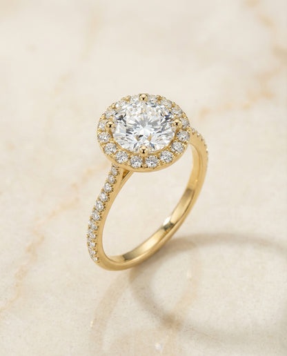 Round Brilliant, Diamond Pavé Halo, in 18K Yellow Gold, pave setting – angled view | RockHer