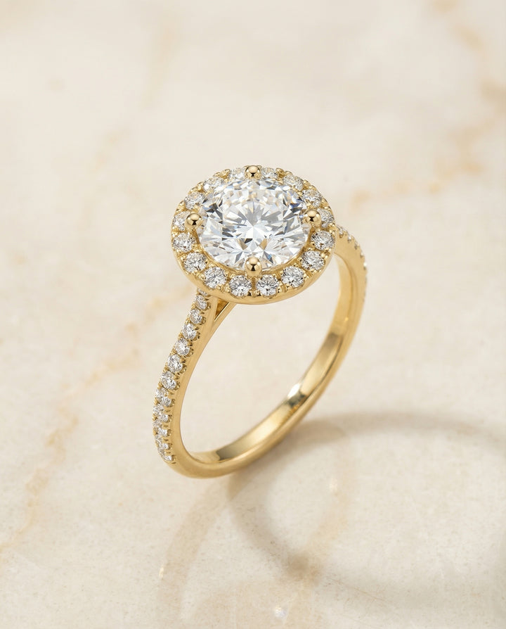Round Brilliant, Diamond Pavé Halo, in 18K Yellow Gold, pave setting – angled view | RockHer