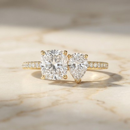 14K Yellow Gold Diana Select Toi et Moi Cushion & Pear Pavé Band Lab Diamond Engagement Ring - Hero on warm marble