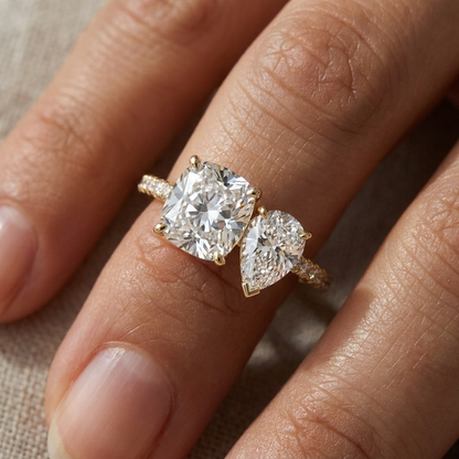 14K Yellow Gold Diana Select Toi et Moi Cushion & Pear Pavé Band Lab Diamond Engagement Ring - Macro close-up on finger