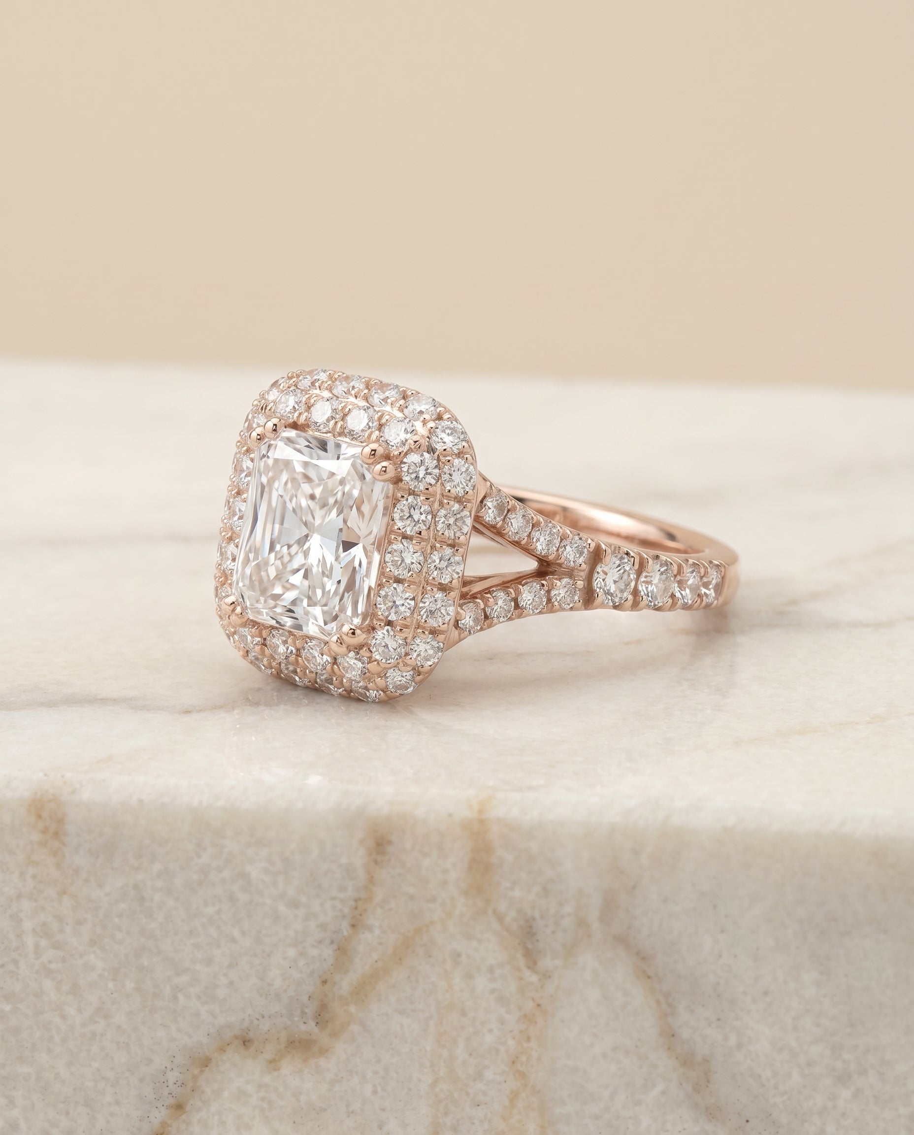 Double Halo Split Shank Radiant, in 14K Rose Gold, prong setting – angled view | RockHer