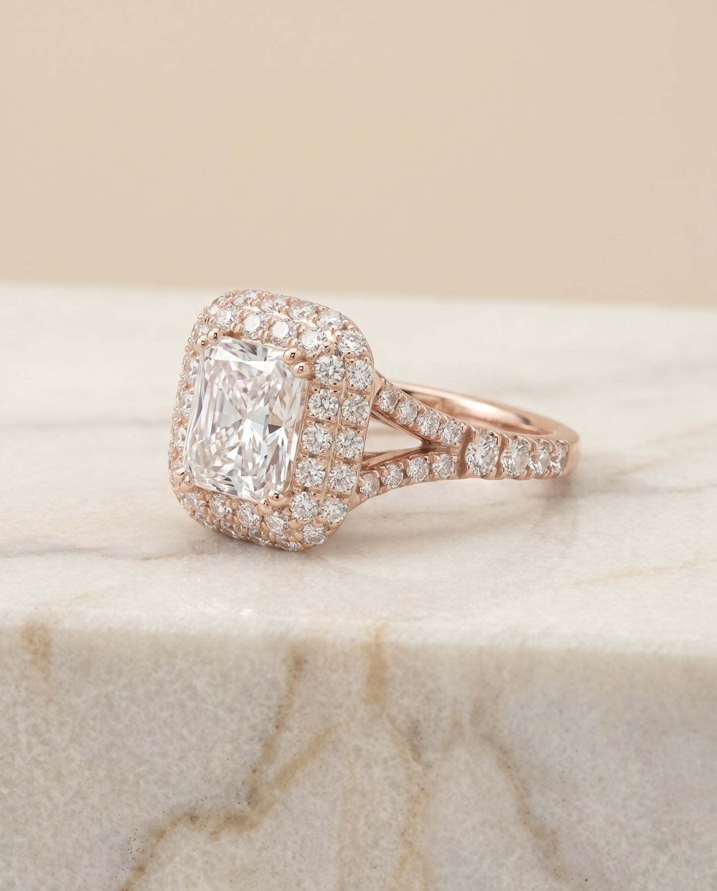 Double Halo Split Shank Radiant, in 14K Rose Gold, prong setting – angled view | RockHer