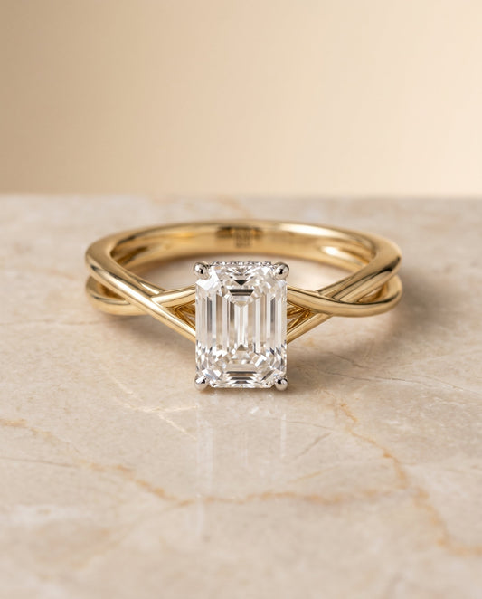 Blondie Select Twisted Shank Double Hidden Halo Solitaire Emerald Cut in 14K Yel – view 1
