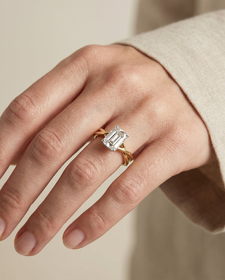 Blondie Select Twisted Shank Double Hidden Halo Solitaire Emerald Cut in 14K Yel – view 3