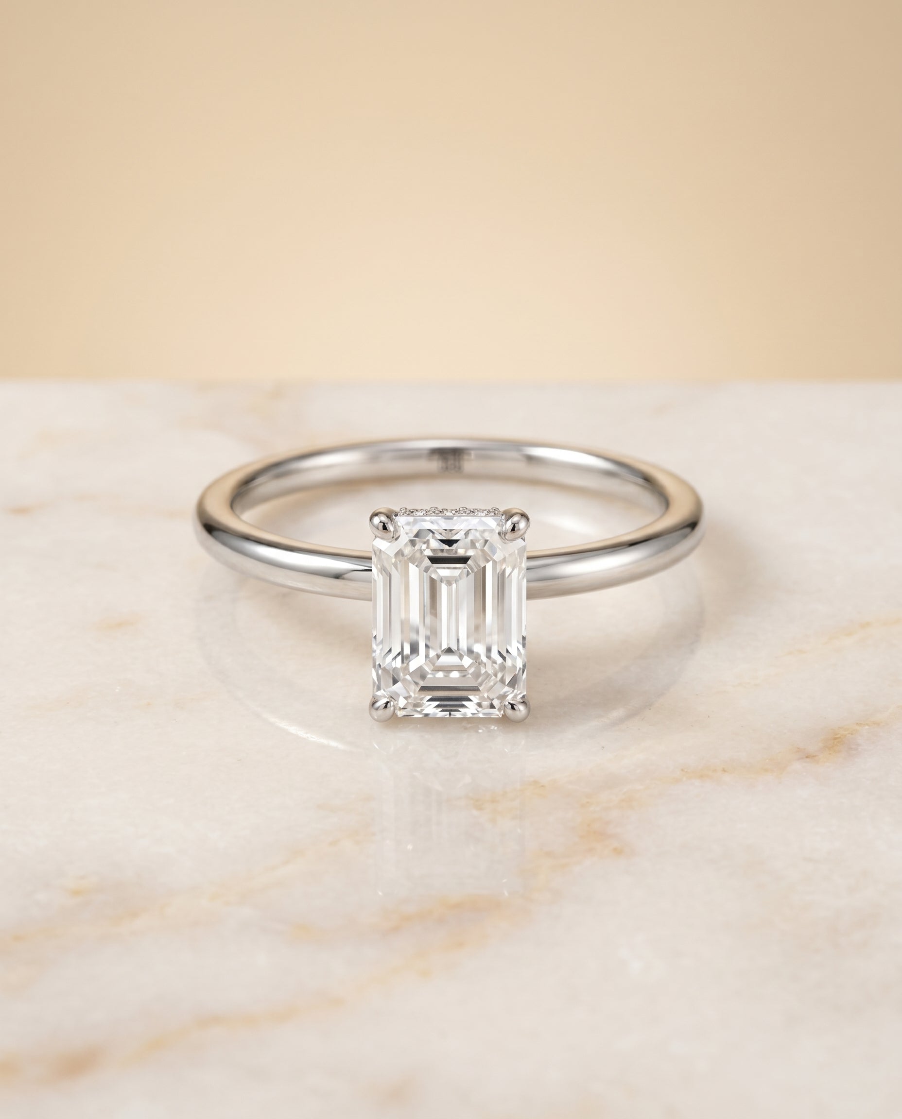 The Dolly Hidden Halo Solitaire Engagement Ring Setting for Emerald Cut Diamonds in Platinum | RockHer