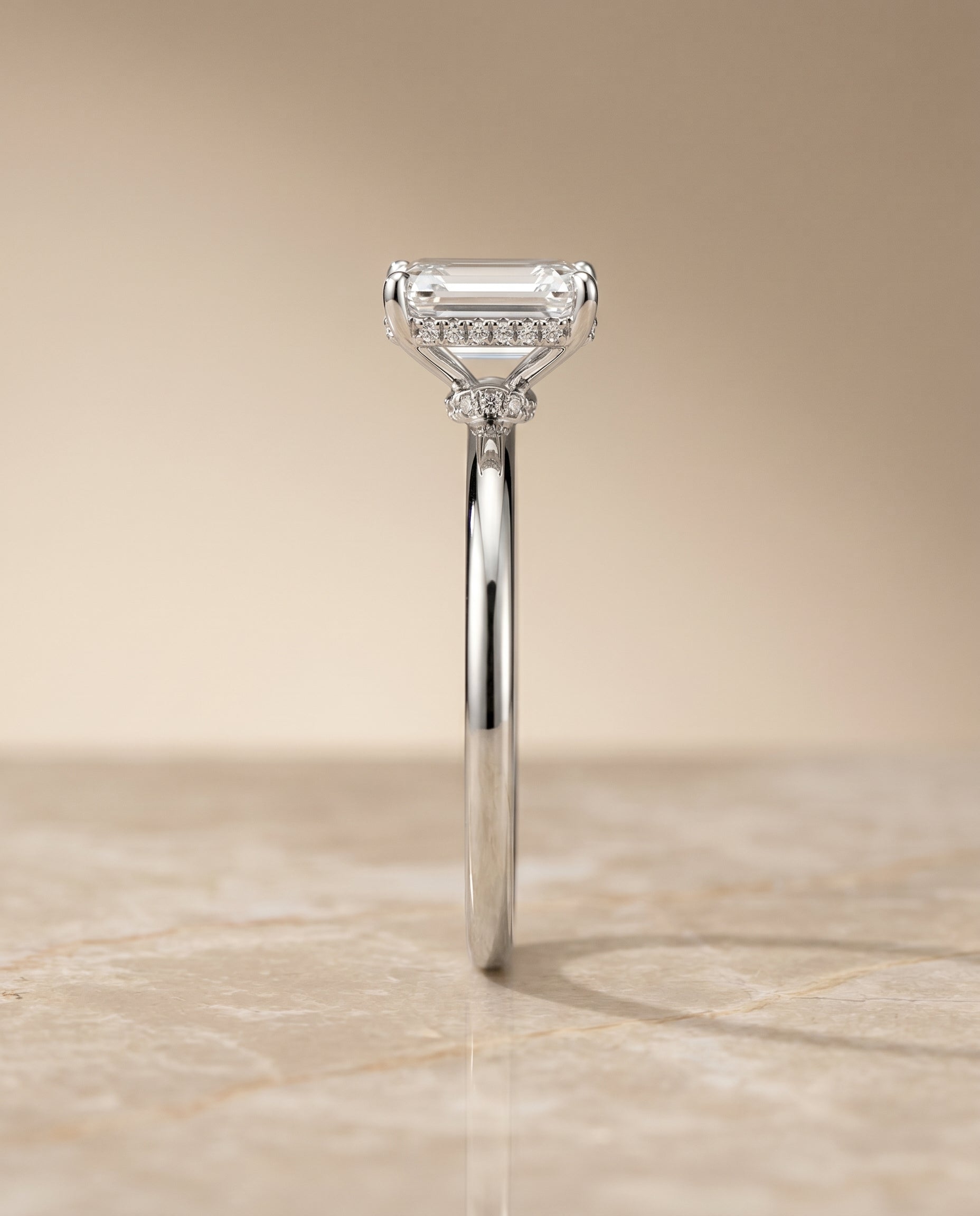 The Dolly double hidden halo solitaire cut engagement ring setting, shown in Platinum | RockHer