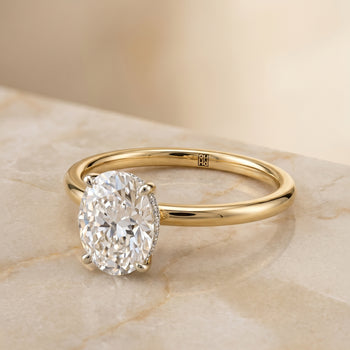 The Dolly Double Hidden Halo Solitaire Oval Engagement Ring Setting in 18K Yellow Gold