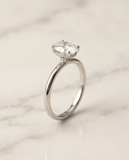 The Dolly Hidden Halo Solitaire Engagement Ring Setting for Oval Diamonds in 18K White Gold | RockHer