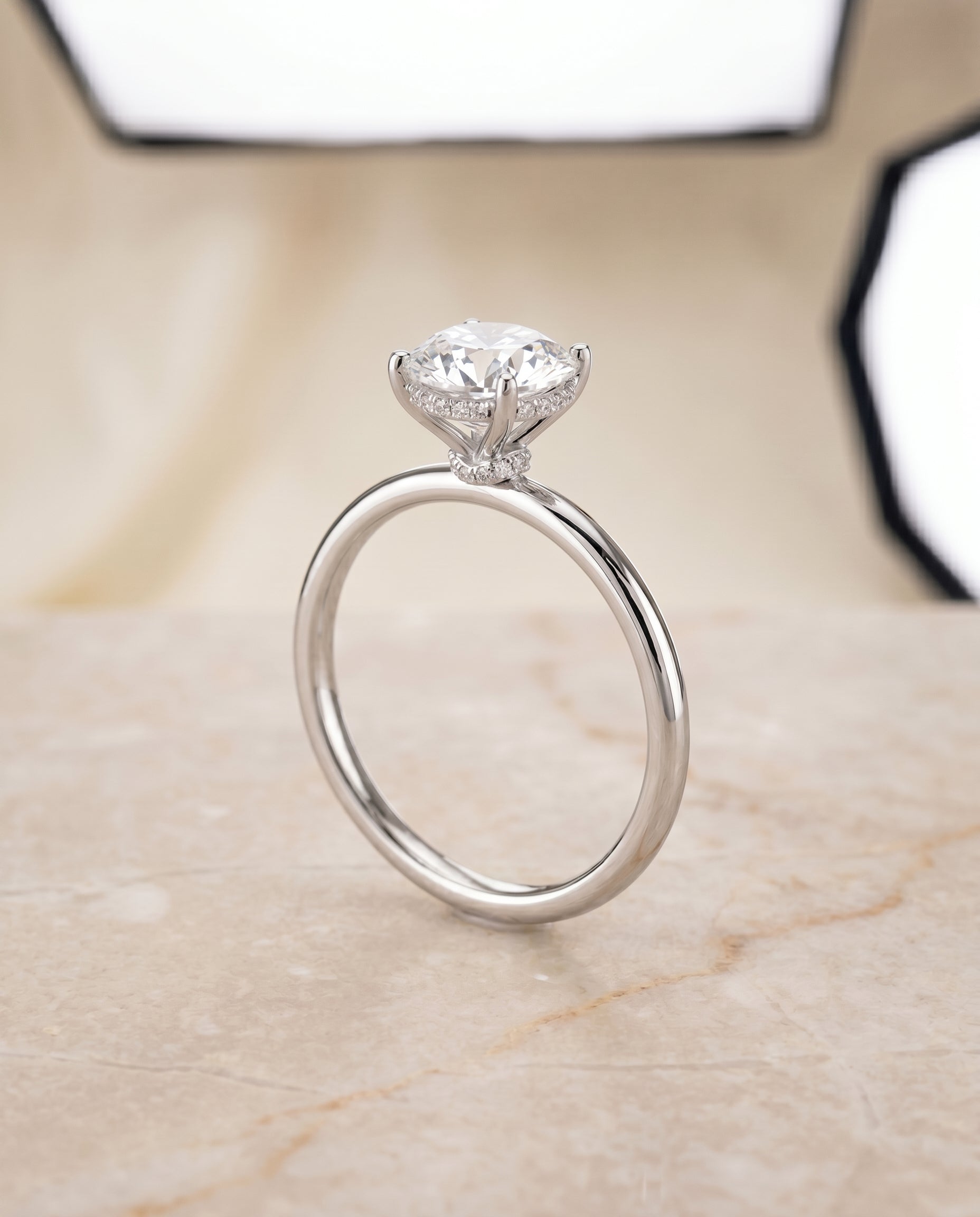 The Dolly double hidden halo solitaire engagement ring setting, shown in 18K White Gold | RockHer