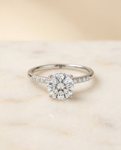 The Abbey Hidden Halo Solitaire Engagement Ring Setting for Round Diamonds in 18K White Gold | RockHer