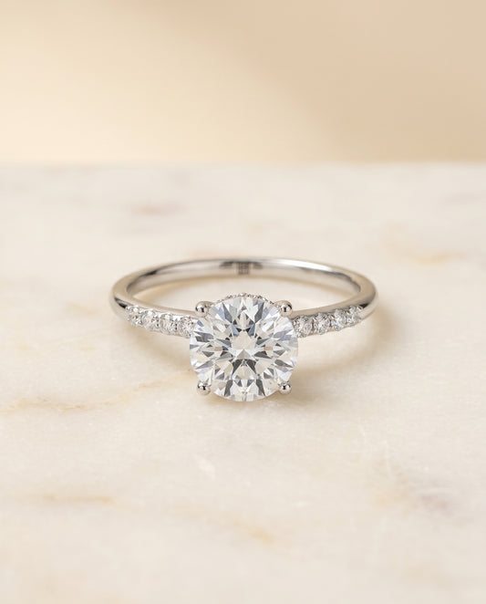 The Abbey Hidden Halo Solitaire Engagement Ring Setting for Round Diamonds in 18K White Gold | RockHer