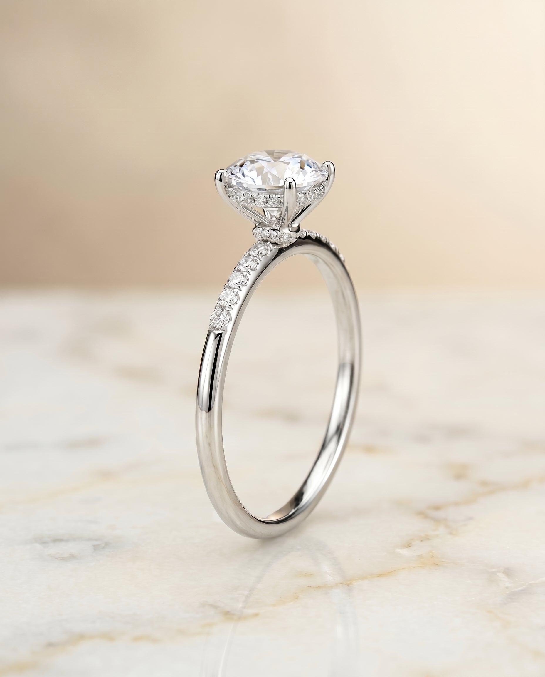 Hidden Halo Pavé styling on The Abbey round engagement ring setting | RockHer