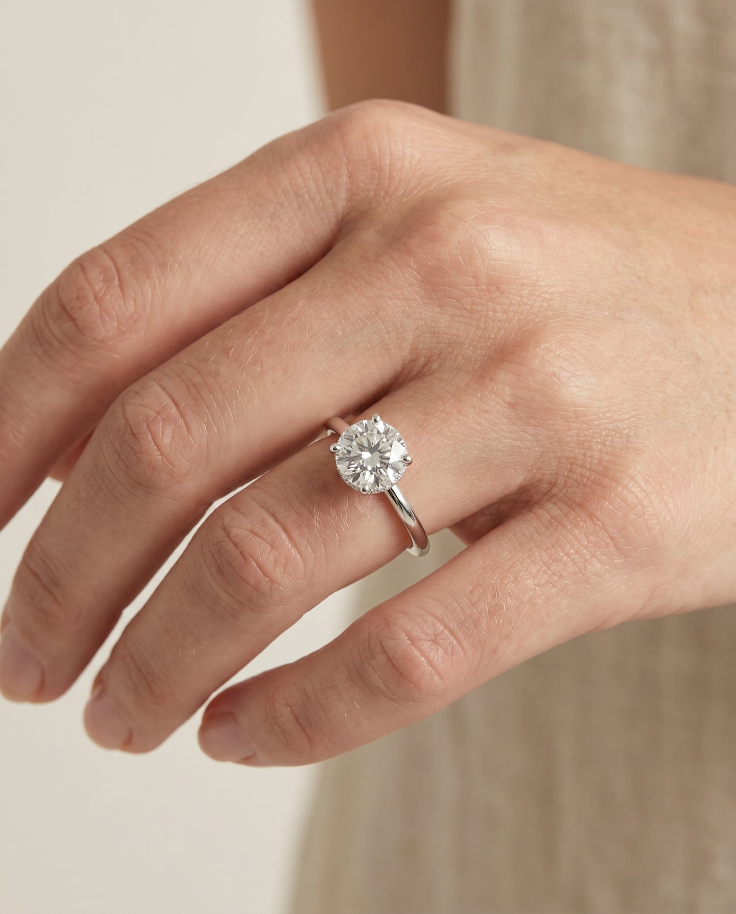 The Dolly Double Hidden Halo Solitaire Round Engagement Ring Setting in 18K White Gold