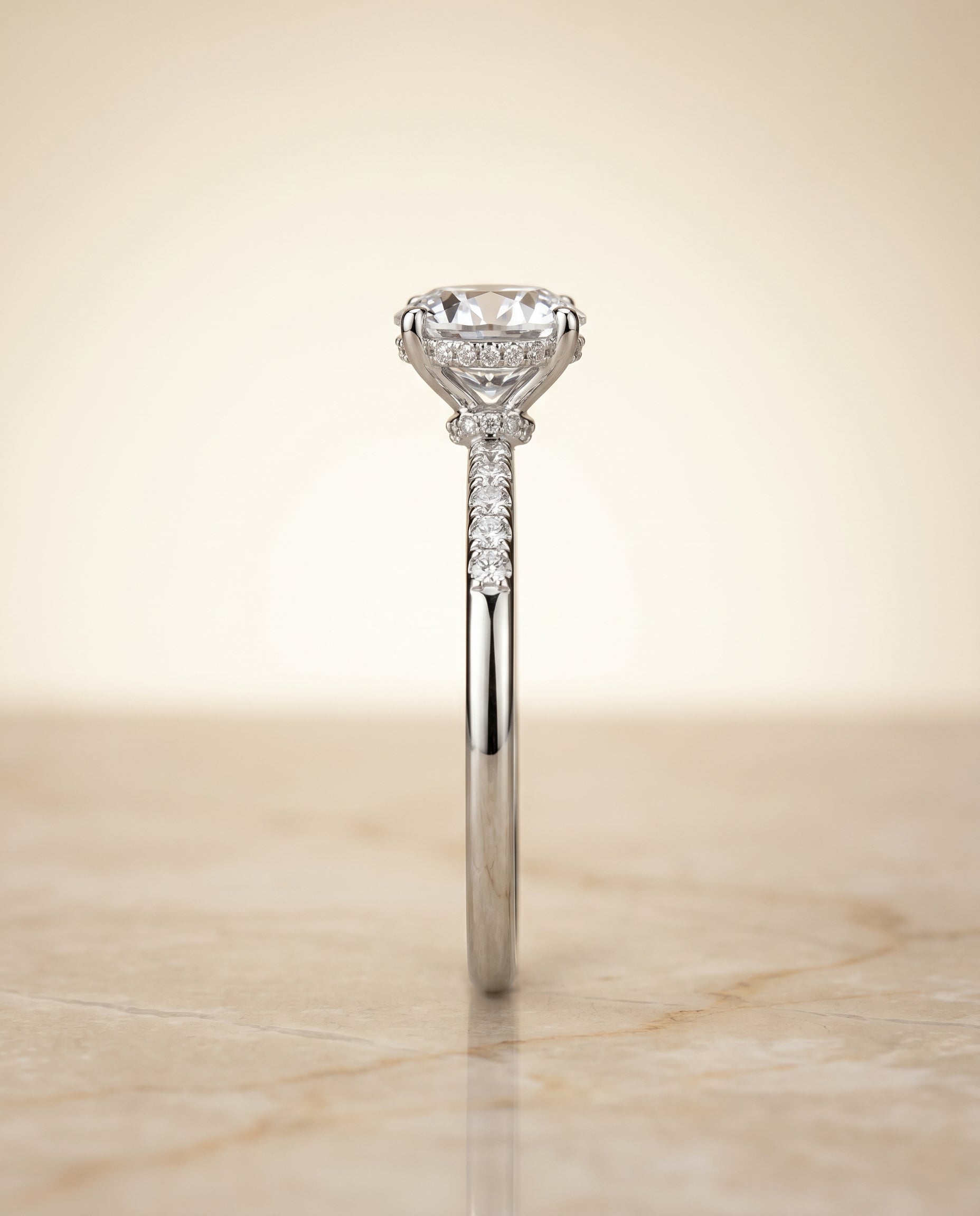 The Abbey hidden halo pavé engagement ring setting, shown in Platinum | RockHer