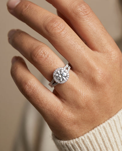 Toni Select Double Row Split Shank Halo Round Lab Diamond Engagement Ring in Platinum, shown on hand, angled | RockHer