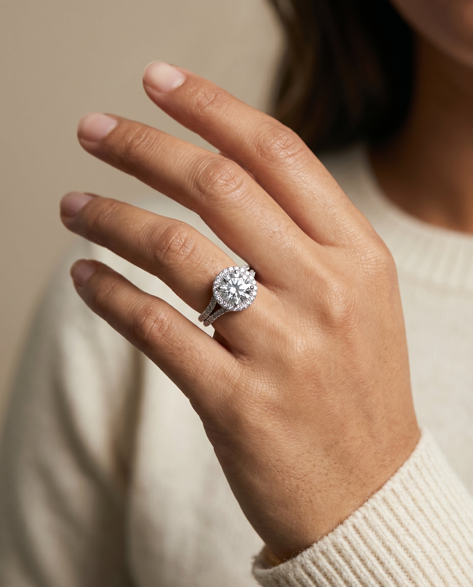 Toni Select Double Row Split Shank Halo Round Lab Diamond Engagement Ring in Platinum, shown on hand | RockHer