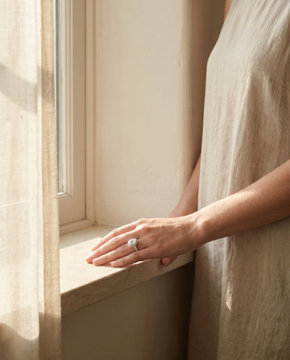 Double Scalloped Pavé Halo Oval, in Platinum, pave setting – lifestyle shot | RockHer