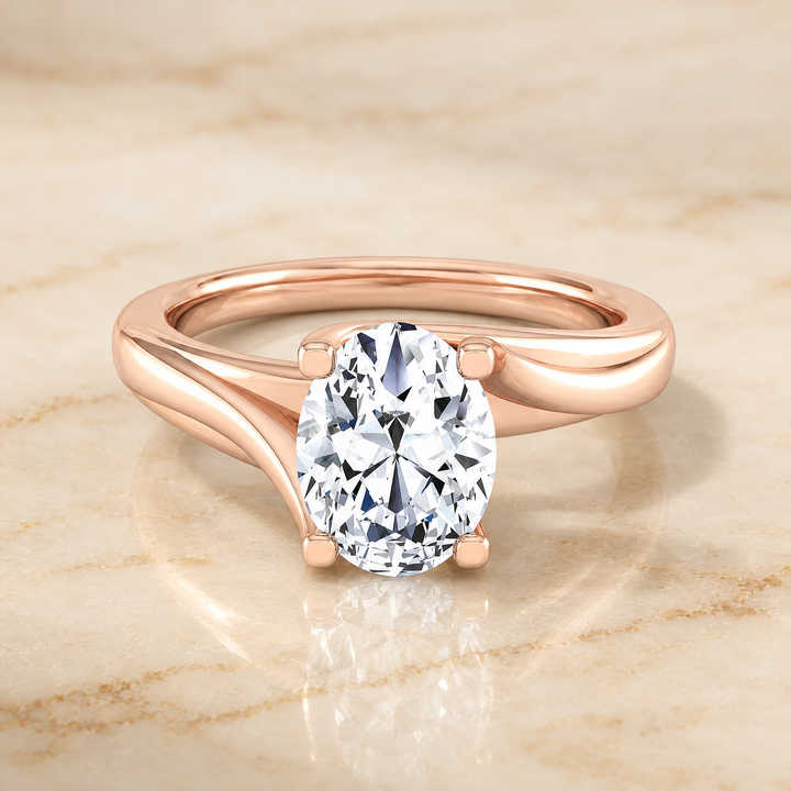 The Joplin Twisted Bypass Solitaire Oval Engagement Ring Setting in 14K Rose Gold