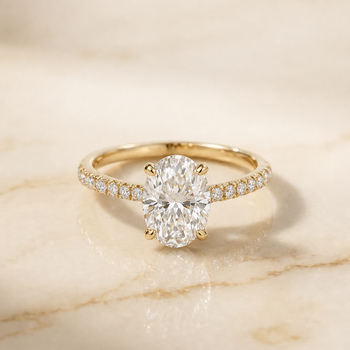 The Donna Cathedral French Pavé Solitaire Oval Engagement Ring Setting in 18K Yellow Gold