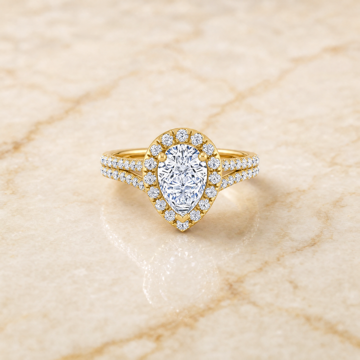The Lira French Pavé Split Shank Halo Pear Engagement Ring Setting in 18K Yellow Gold