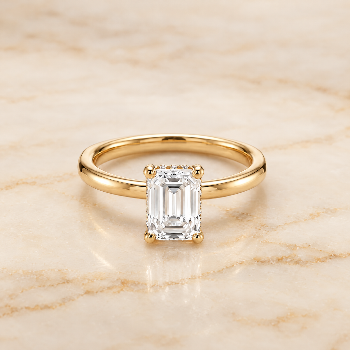 The Lana Secret Halo Adorned Prong Solitaire Emerald Cut Engagement Ring Setting in 18K Yellow Gold
